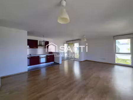 appartement 3 pièces de 71 3 m² avec loggia  place de parking et ascenseur