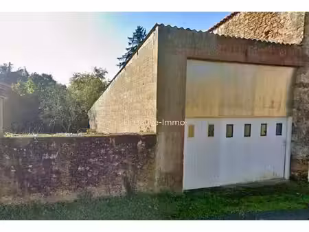 hangar à usage de garage  cave et stockage sur terrain de 65m²