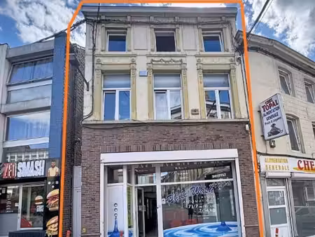 immeuble de rapport - deux beaux appartements et commerce oc