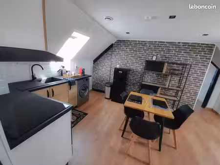 studio équipé face gare avec place de parking