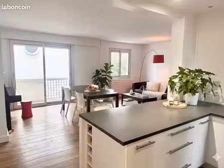 appartement 4 pièces rénové avec balcon et cave de 92 m2. mairie de boulogne billancourt  