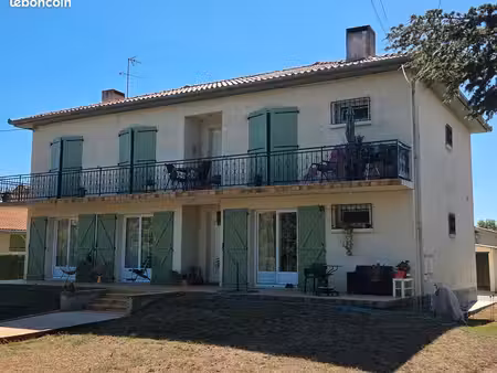 maison 2 appartements + garages
