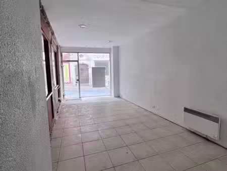 local commercial – centre-ville – place du lion d’or