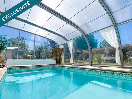 maison individuelle 147 m² – 4 chambres – terrain 990 m² – piscine couverte et chauffée