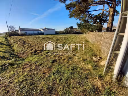 terrain constructible de 1208m²