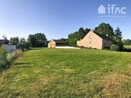terrain à bâtir : habitation ou habitation + commerce