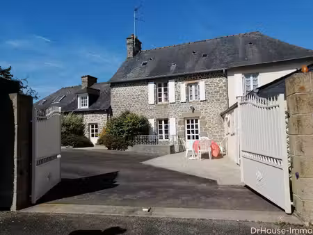 a 7 mn de gorron  environ  belle maison en pierres  3 chambres  garage avec terrain de 125