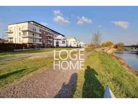 appartement rez-de-chaussée avec jardin privatif et garage à la bassée