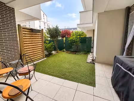 appartement 2 pièces avec jardin et parking dans une résidence récente