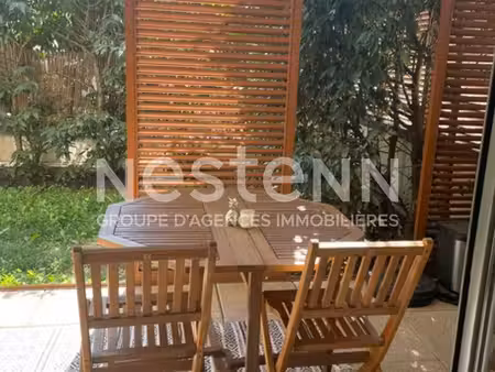 appartement 2 pièces à vendre à tassin-la-demi-lune - rez-de-jardin  garage fermé