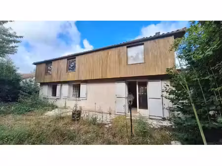 maison proche commerces
