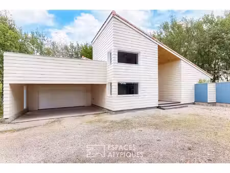 maison d'architecte avec piscine et terrain boisé