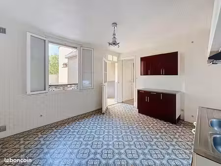 appartement ~40 m² en rez-de-chaussée  avec 2 places de stationnement