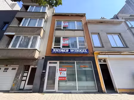 handelsgelijkvloers met woonst en tuin