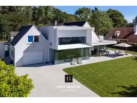 luxe villa langs de duinbossen tussen de haan en wenduine