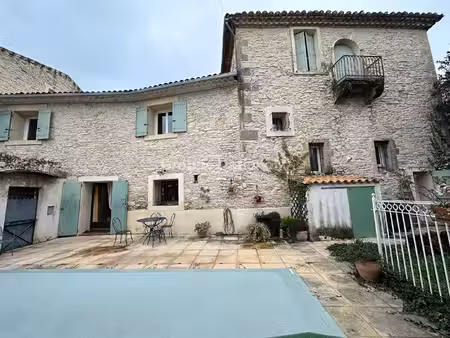 vaunage maison en pierres 8 pièces avec jardin pisccine et grand garage