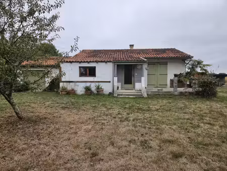 petit bungalow de village avec terrain