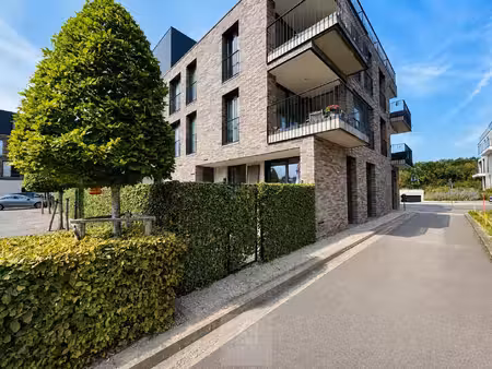 recent gelijkvloers 2-slaapkamerappartement met tuin aan de leieboorden