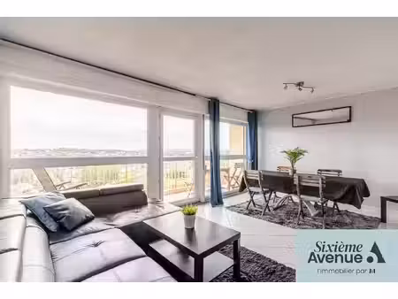 appartement 3 pièces 69.53 m2  stationnement  balcon et cave!