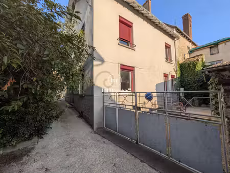 immeuble en pierre rénové avec jardin et garage