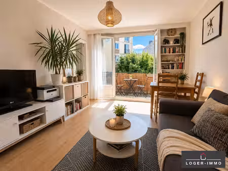 appartement lumineux 3 pièces avec balcon  cave et parking