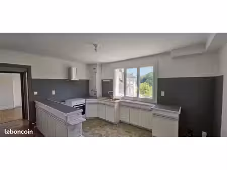 appartement de 85 m² avec garage et cave à proximité du cinéma