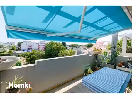dpe c appartement 3 pièces de 65 m² avec terrasse et garage à nîmes capouchiné