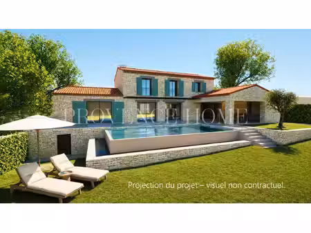 a vendre gordes terrain constructible de 1 800 m² avec permis accordé  vue panoramique ...
