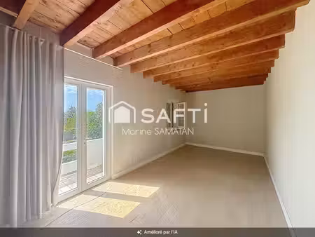 maison mitoyenne à rénover avec locaux et garage