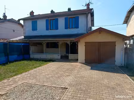 maison avec terrain clos  garage  caves et pompe à chaleur