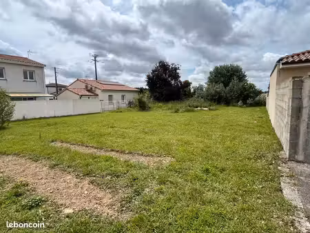 terrain proche ecole et commerces