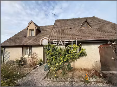 idéalement située  en plein centre maison 4 chambres avec une vie de plain-pied