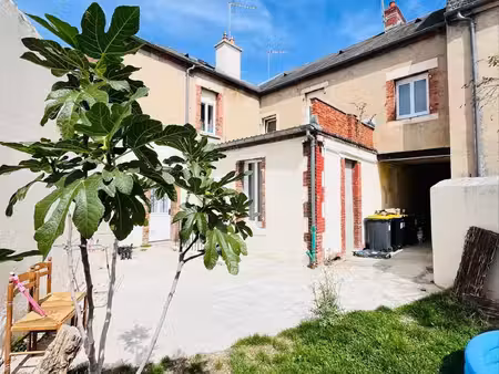 immeuble de 4 appartements avec jardin