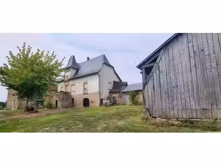 propriété agricole de 30h avec un lac et une maison