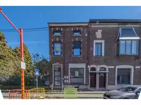 immeuble 4 unités en ordre d'urbanisme + parking !