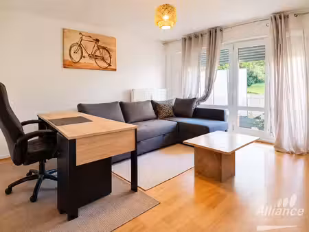 montbéliard f2 avec balcon  cave et parking privatif re