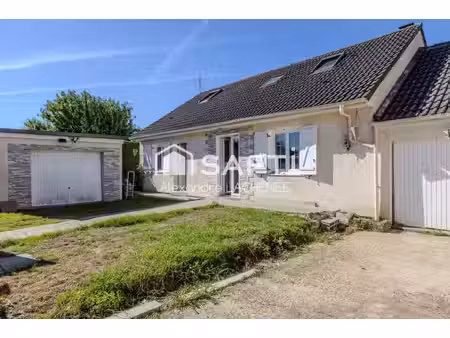 maison rénovée avec véranda  jardin  à lormaison