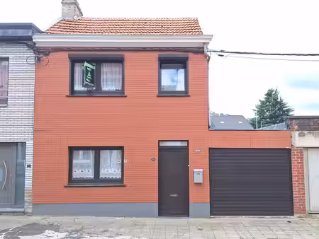 maison une chambre avec garage et terrasse