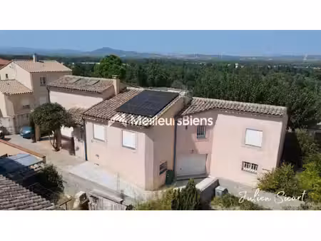 maison familiale de 161 m² avec grand garage  jardin et piscine