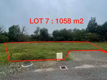 vente terrain 1058 m² à biron (64300)  74 100 €