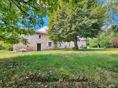 magnifique longère en pierre  dépendances et plus de 2.7ha de terrain – charme et potentie