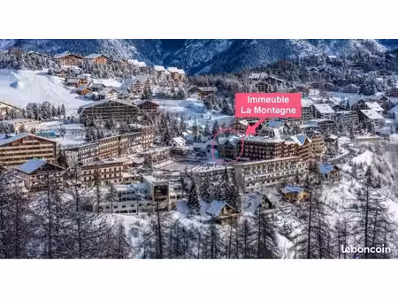 a vendre ou à louer 2 garages fermés place centrale d’auron résidence la montagne