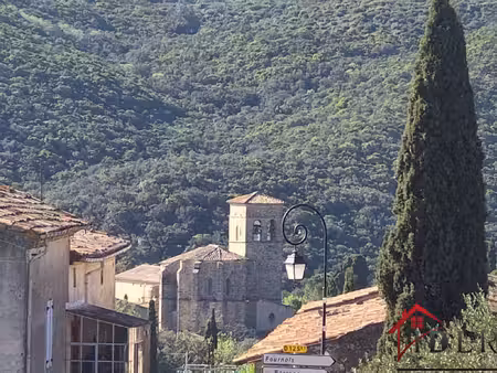 maison de village avec garage et potentiel