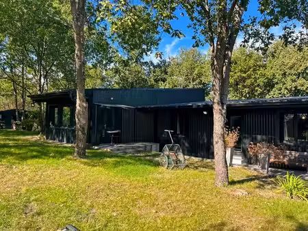 maison atypique de 100 m² habitable de plain pied sur un terrain clos arboré