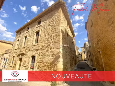 vers-pont-du-gard  en nouveauté très bel immeuble en pierre restauré avec quatre apparteme