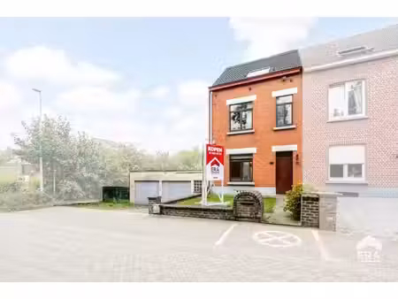 maison 3 façades avec 3 ch.  grand jardin et garage/atelier