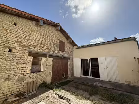 maison en pierre- exterieur- vaste garage