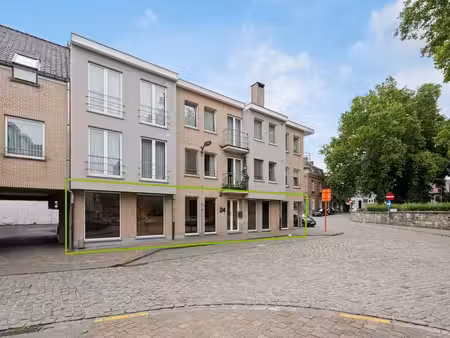 sous option - bien commercial à vendre à sint-pieters-leeuw