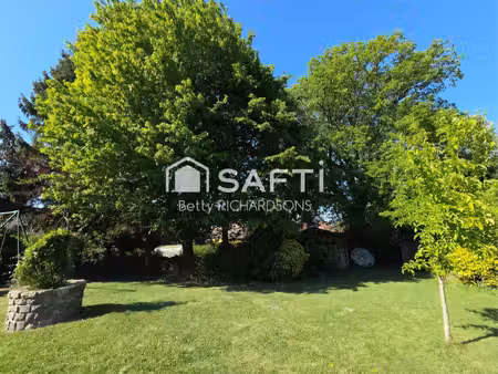 semi plein pied. 5 chambres. sous sol. beau jardin