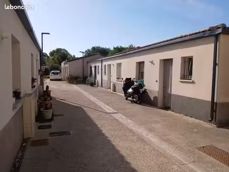 maison dans résidence